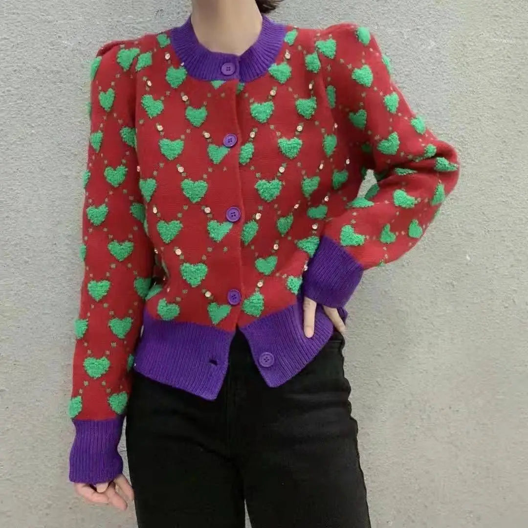 Heartfelt Knit: Cozy Cardigan with Playful Pom-Pom Details